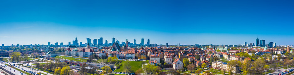 Historic cityscape panorama with high angle view of colorful architecture rooftop buildings in old town market square. Aerial