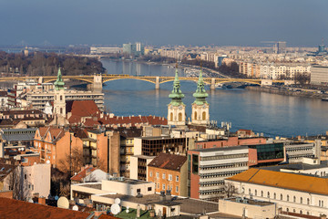 Hungary, Budapest, Fischerbastei: View from famous Fisherman's Bastion over Donau Danube river with Margaret Bridge or Margit híd, church, apartment buildings in the center of the Hungarian capital.
