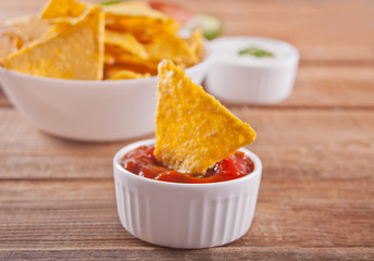 Mexican corn chips nachos with salsa dip