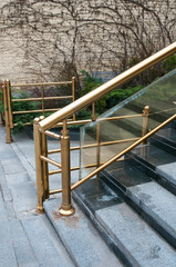 railing and pavement in recreation areas and near architectural buildings