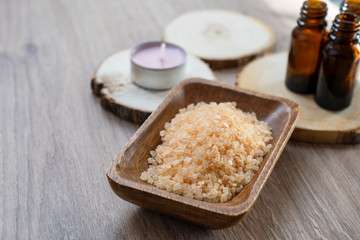 Spa sea salt in wooden bowl closeup