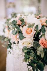 The wedding decor. The white flowers bouquet