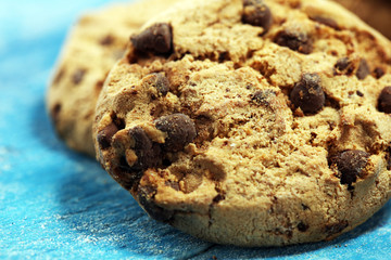 Chocolate cookies on wooden table. Chocolate chip cookies