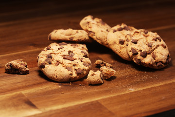 Chocolate cookies on wooden table. Chocolate chip cookies