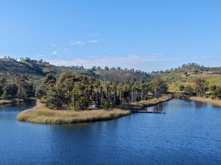 Aerial view of Miramar reservoir in the Scripps Miramar Ranch community, San Diego, California. Miramar lake, popular activities recreation site including boating, fishing, picnic & 5-mile-long trail.