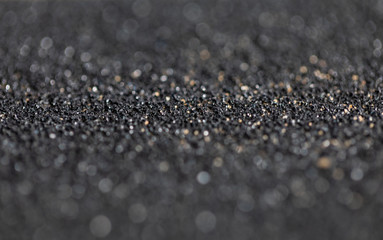 Sandpaper black bokeh light effect with soft  background