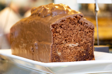 Cake with chocolate coating and nuts