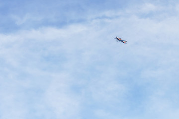 Private jet against blue sky and clouds, Puglia, Italy