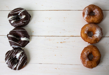 donut, donut classic, donut according to an old recipe, Ukrainian donuts. Three chocolate donuts...