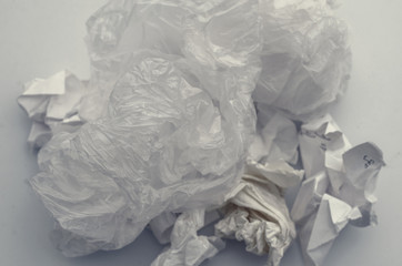 Crumpled sheets of paper, trash. Pollution, waste, ecology