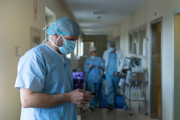 Doctor using mobile in hospital. Medical concept