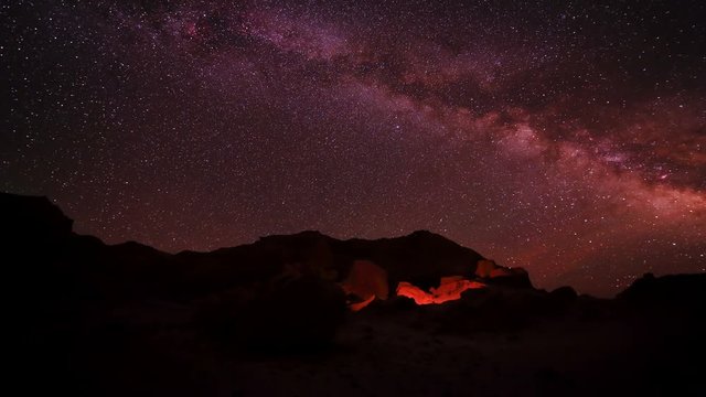 4K. Starry Night over the canyon Bayanzag, Mongolia. Ultra HD, 4096x2304