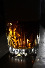 cold beer glass on black background