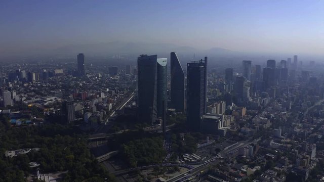 DRONE FLIGHT OVER BUILDINGS AND SKYSCRAPERS. CIRCUITO INTERIOR AVENUE. MEXICO CITY.