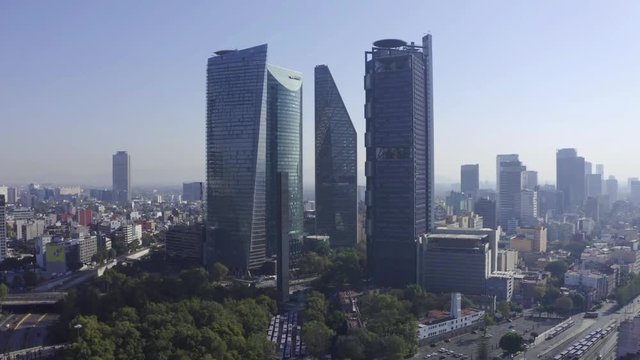 DRONE FLIGHT OVER BUILDINGS AND SKYSCRAPERS. CIRCUITO INTERIOR AVENUE. MEXICO CITY.