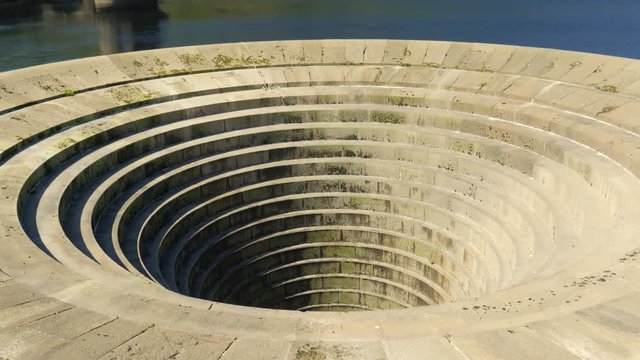 Lady bower giant plug hole close up famous location attraction tourist within the peak district summer sunny day calm waves shot in 4K