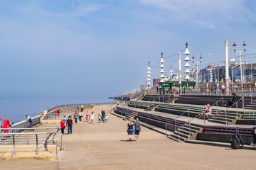 Blackpool, England _April 21, 2019: People enjoy a warm and sunny Easter weekend at the seaside.