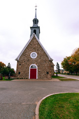 Fototapeta na wymiar Old church on the Orlean island in Quebec, Canada.