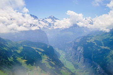 Alpine peaks of Grindelwald and Jungfrau. Landskape background of Bernese highland. Alps, tourism, journey, hiking concept.