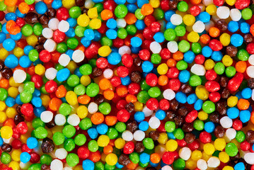Fototapeta na wymiar Background texture of bright colorful sweets.