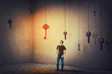 guy looking up finding the magic key to success