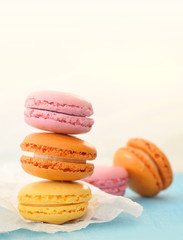 Macarons assorted on blue background