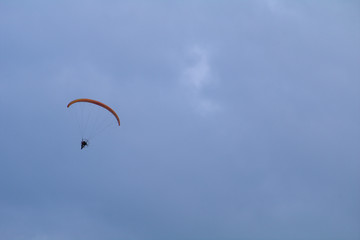 paraglider in the sky,motorized,extreme, paragliding, sport, fly,flying, air, freedom, gliding, adventure,wind, activity, 