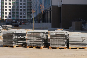 Construction Materials. Building materials for construction of residential complex. Pile of bricks at construction site.