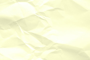 Paper beige color is crumpled and aged. The texture of the surface is old and wrinkled in vintage...