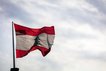 The Lebanese flag flying over Beirut, Lebanon in Spring