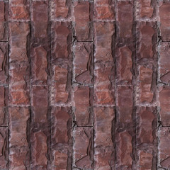 Seamless pattern of red wall from natural stone bricks.