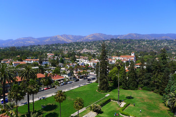 View on City of Santa Barbara from County Courthouse with greenfield in the front. - obrazy, fototapety, plakaty