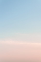 Beautiful sunset sky with feathery pink clouds in spring