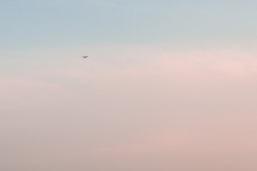 Beautiful sunset sky with feathery pink clouds in spring