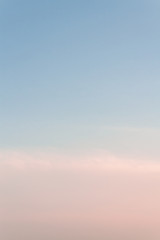 Beautiful sunset sky with feathery pink clouds in spring