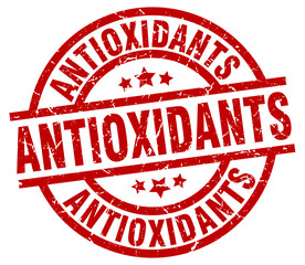 antioxidants round red grunge stamp