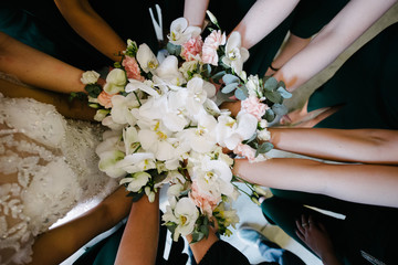 Bridesmaids bridesmaids from flowers on their hands