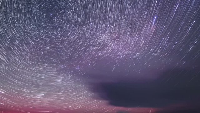 4K. Starry night over the island Olkhon. Burkhan Cape, Olkhon island, Lake Baikal, Irkutsk region,