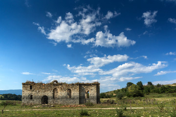 Fototapeta na wymiar Ancient Medieval Eastern Orthodox church of Saint John of Rila at the bottom of Zhrebchevo Reservoir, Sliven Region, Bulgaria