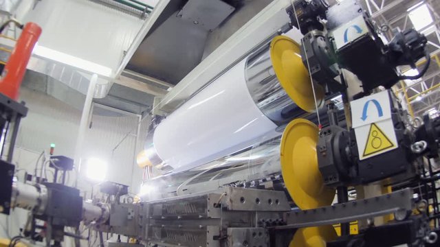 motion to press machine operating with piece of material