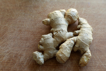ginger plant product on wooden background