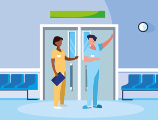 interracial couple medicine workers in elevator door