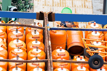 gas butane bottles with delivery worker and truck , gpl lpg - obrazy, fototapety, plakaty