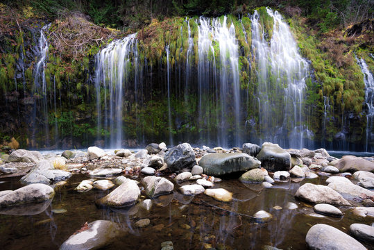 falls in between rocks