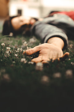 man laying on grass