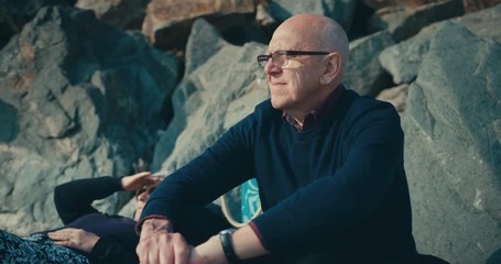 Senior couple relaxing on the beach