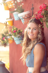 blonde woman in the field smiling