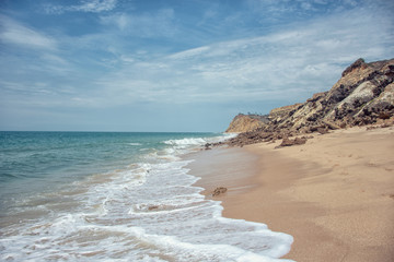 Beautiful sea cost view. Atlantic ocean costline, sandy beach Sangano, Angola under sunlight in summer sunny day