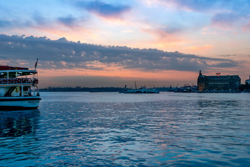 Obraz premium Istanbul, Turkey, 11 June 2007: Sunset of Kadikoy, Haydarpasa Railway Station