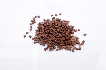 roasted coffee beans isolated on white background top view